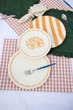 Teller_Arrangement_gelb_Muschel_Gestreift